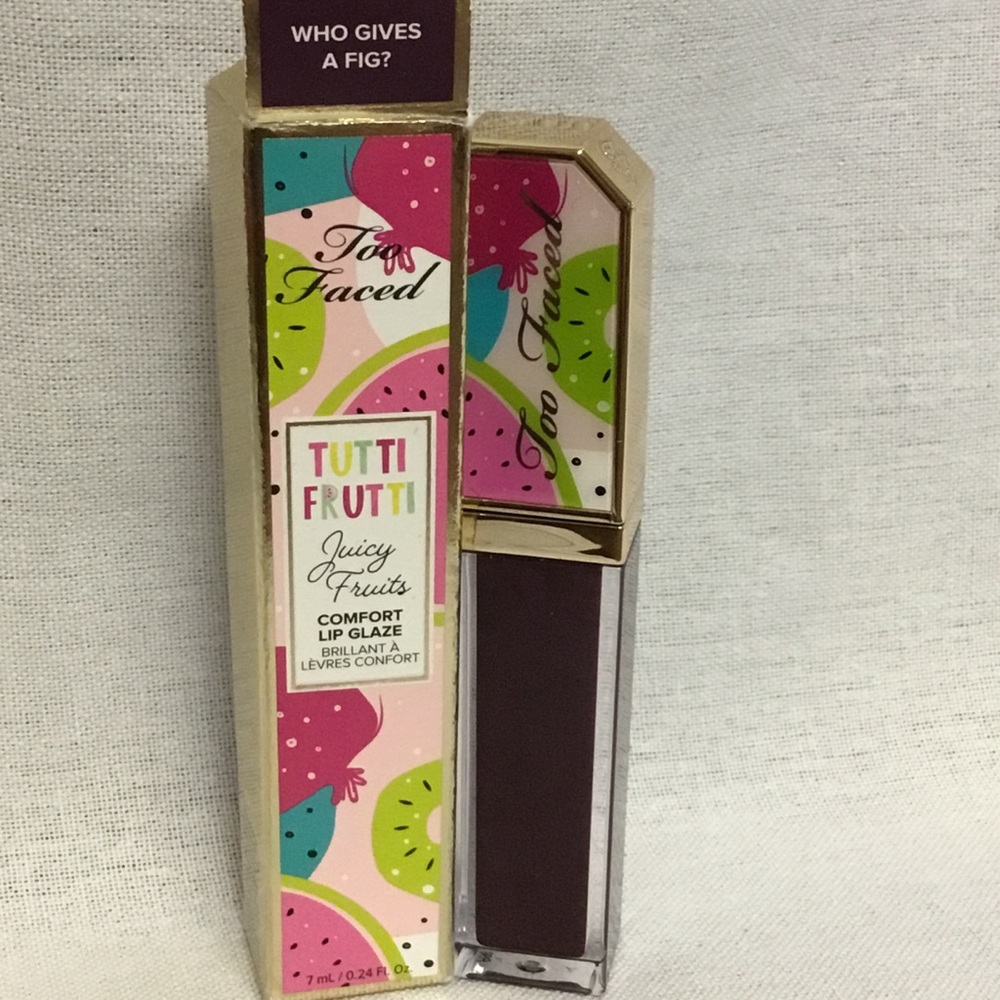 Too faced tuttifrutti lip glaze “who gives fig”new